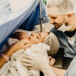 mother and new born first embrace